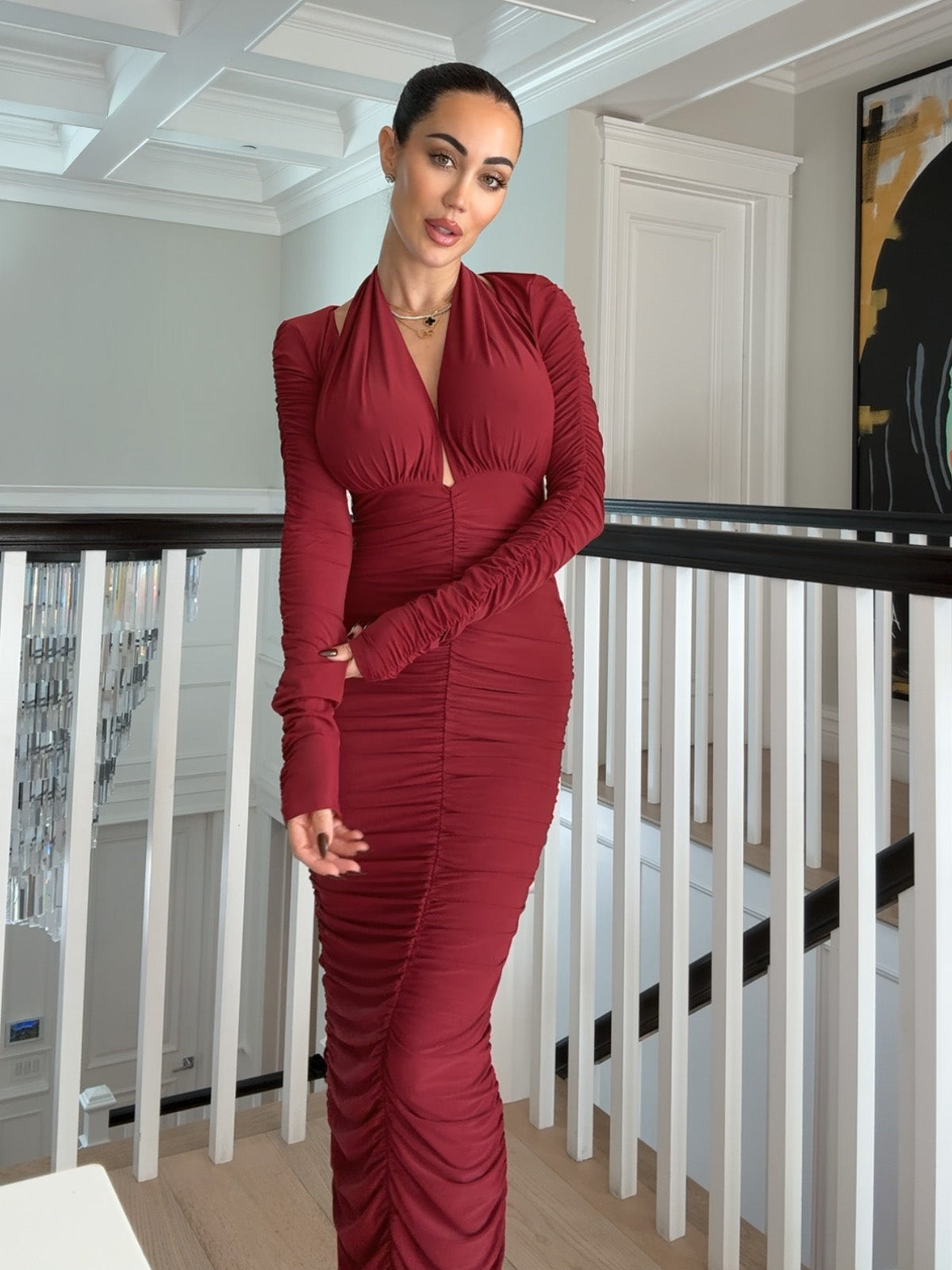 Burgundy ruched bolero styled over sleeveless maxi dress