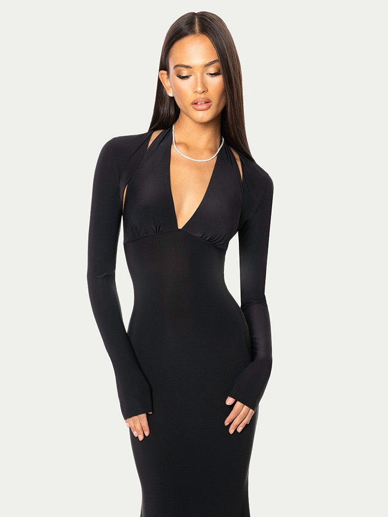 Minimal black bolero worn with strapless dress for elevated look