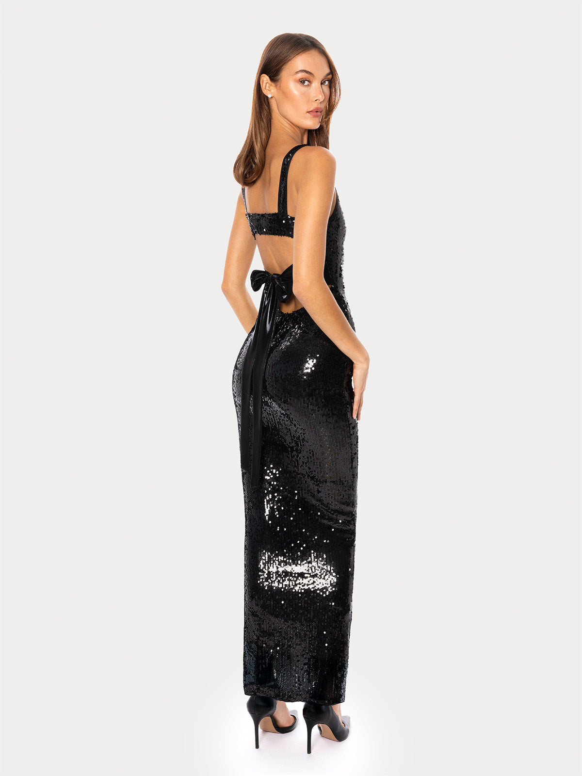 Black sequin maxi dress with sculpted silhouette and open back