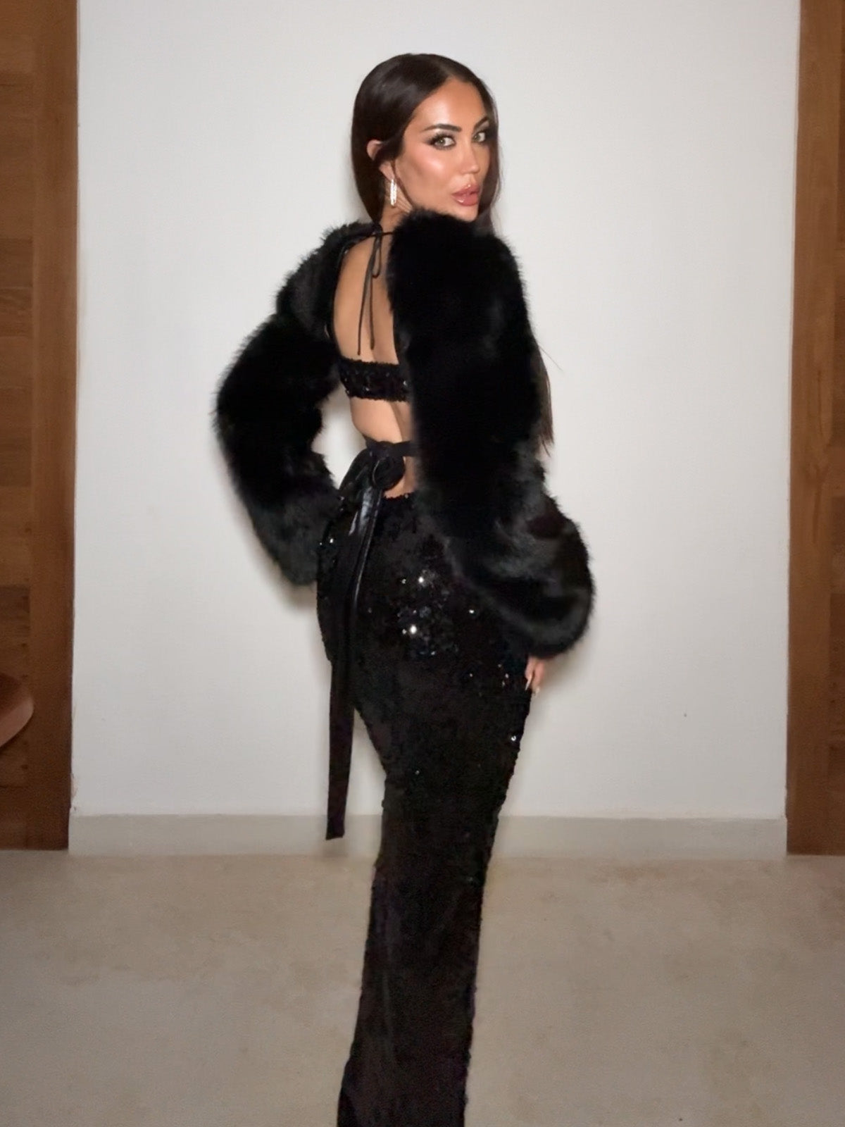 Black sequin maxi dress with faux fur