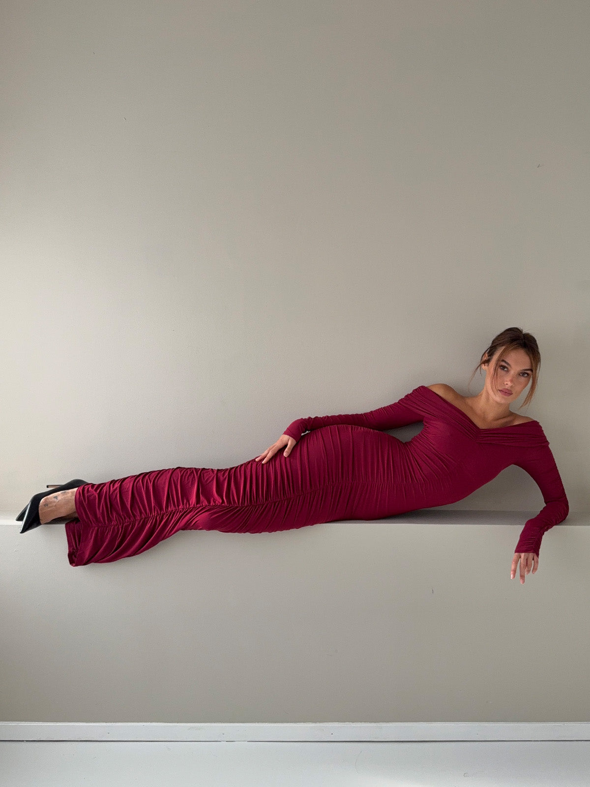 Burgundy off-shoulder maxi dress with sweetheart neckline and covered arms