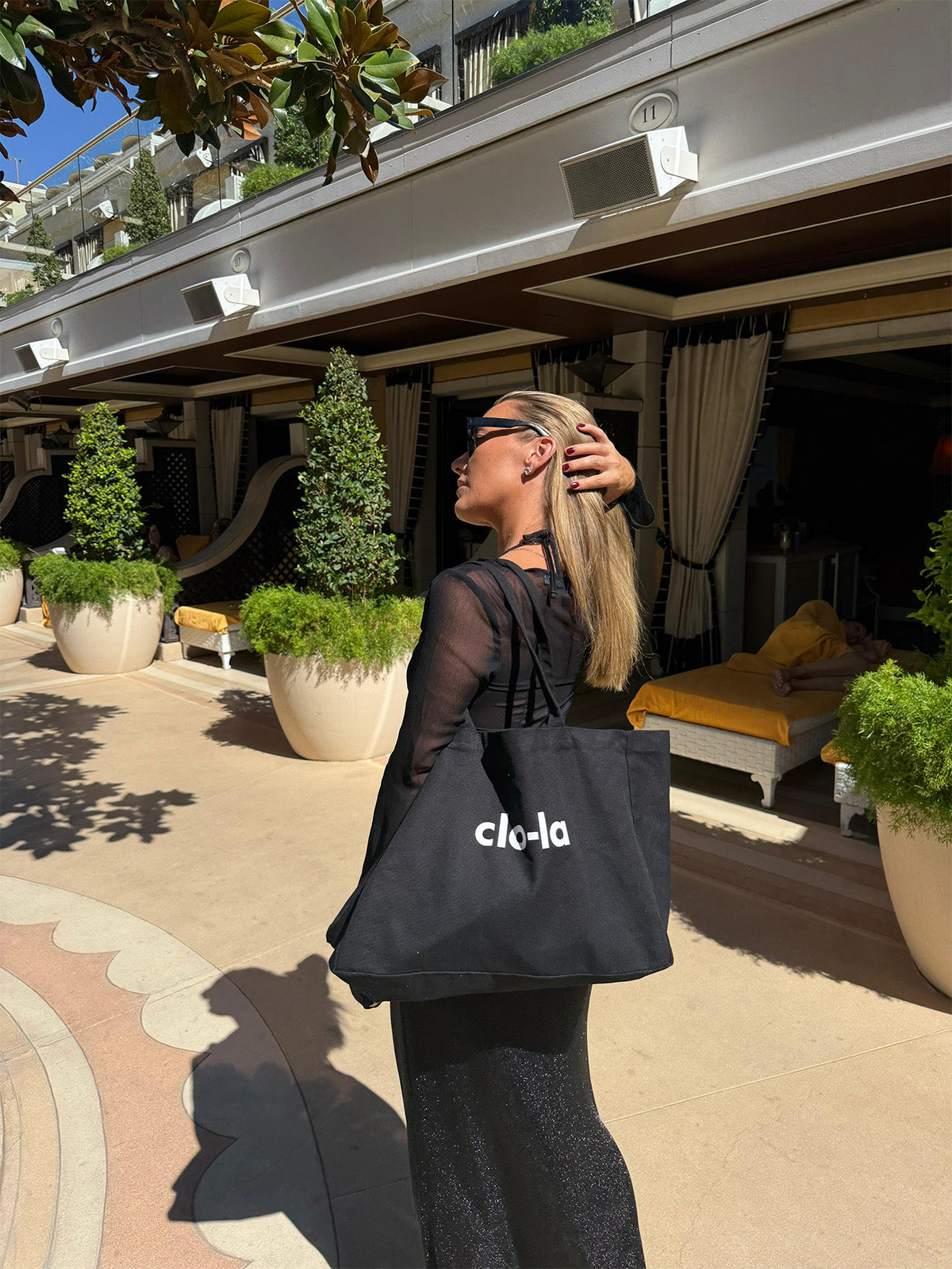 Large black tote bag for beach, gym, and everyday essentials