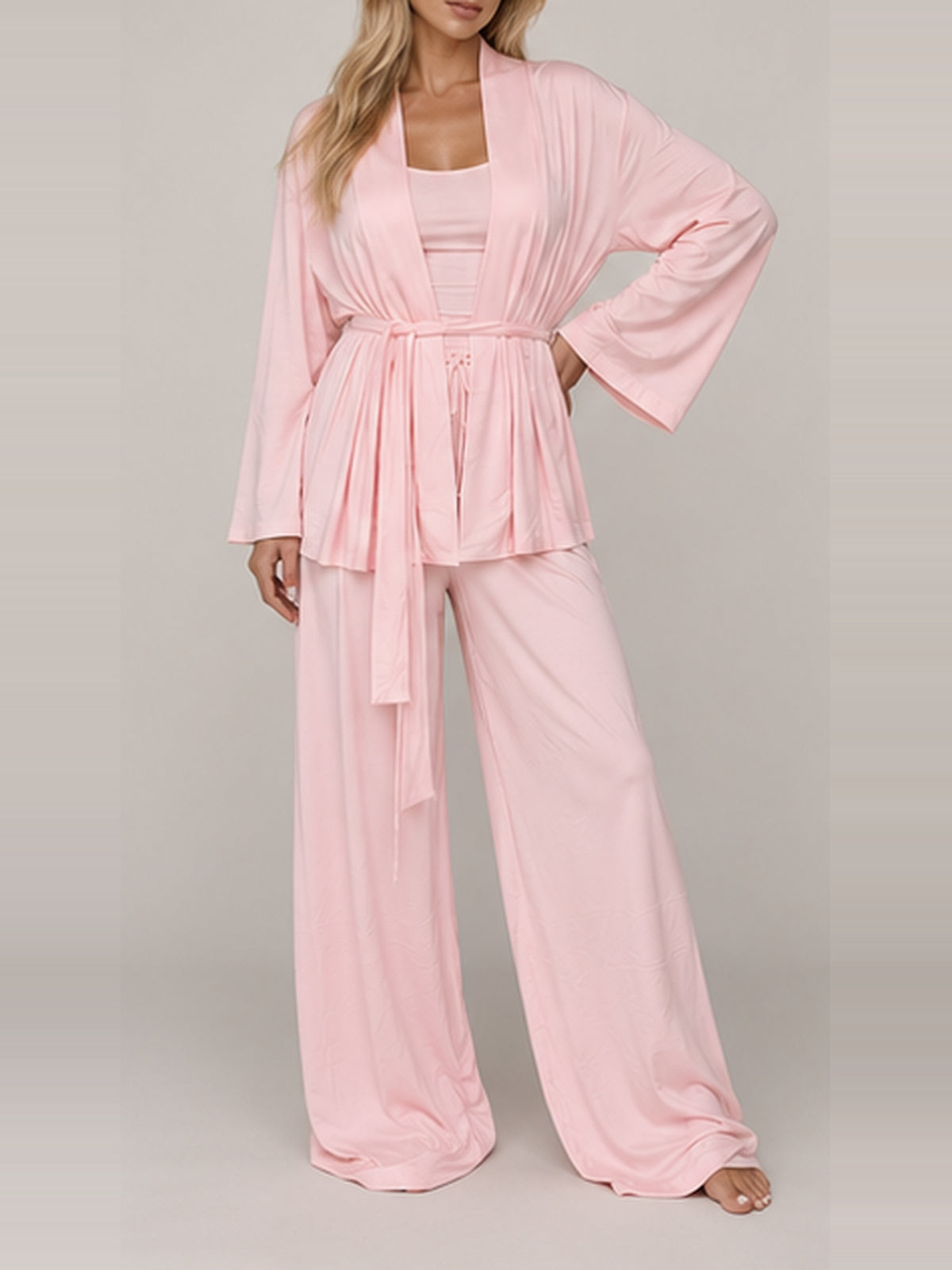 Pink Lounge Pyjama Set with kimono, faceless hand-on-hip view.