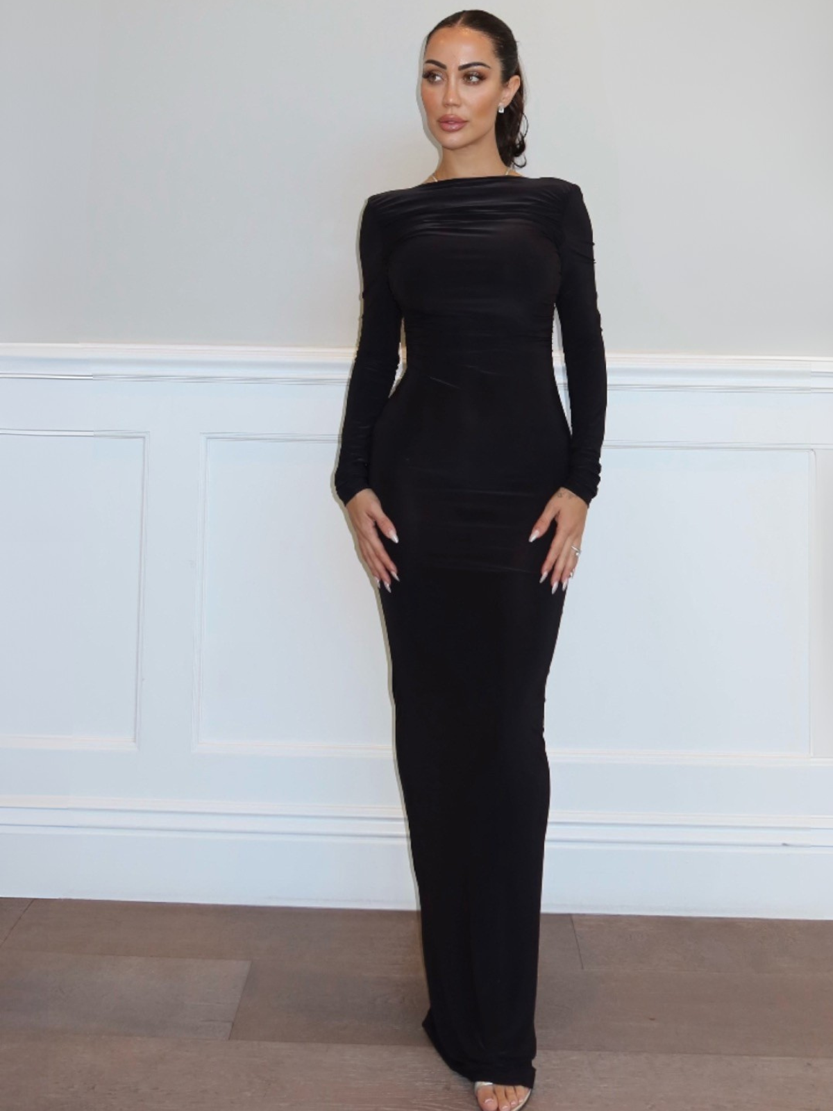 Black long sleeve maxi dress with fitted bodycon silhouette front view