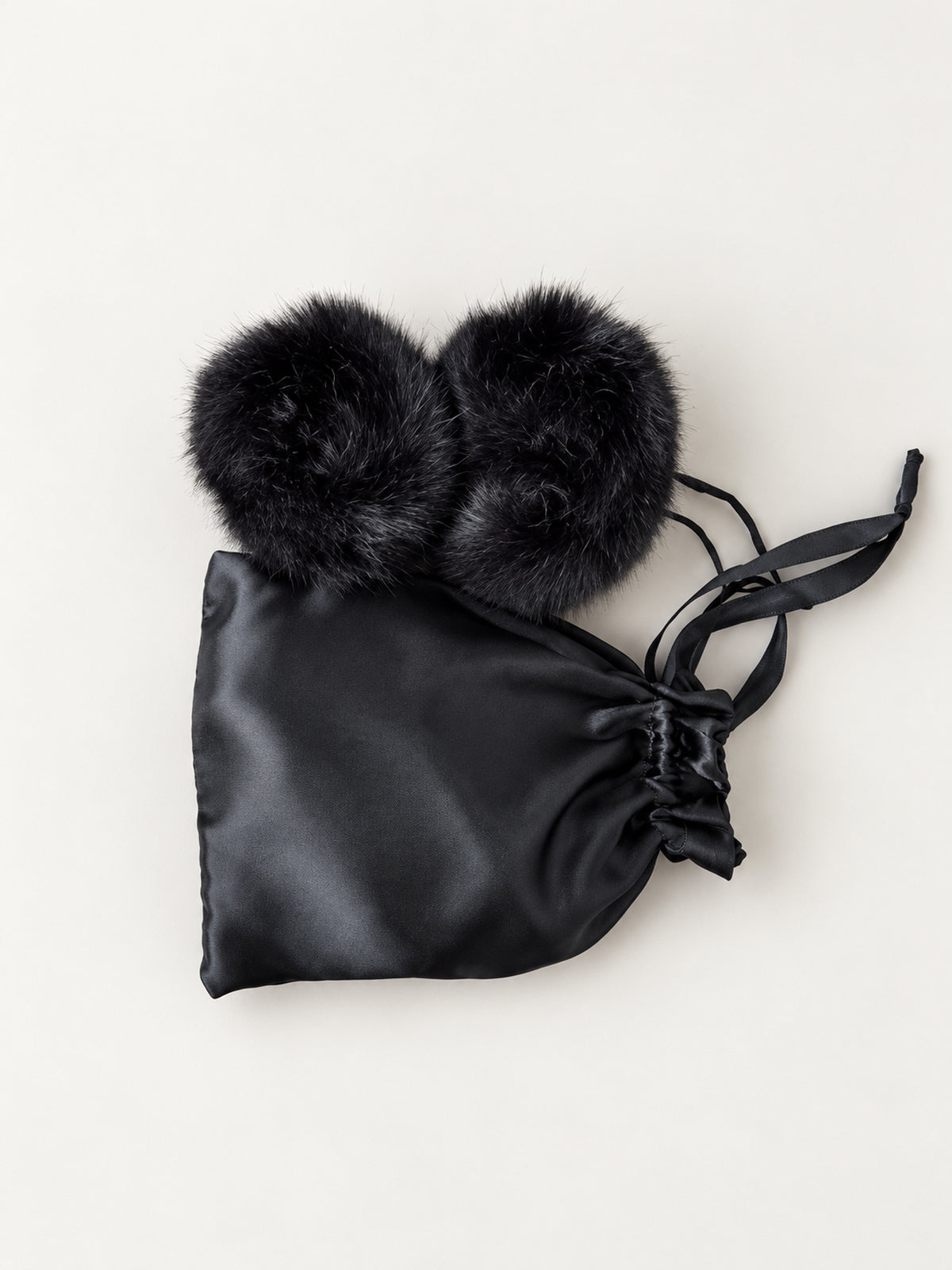 Black faux fur slap cuffs with satin pouch