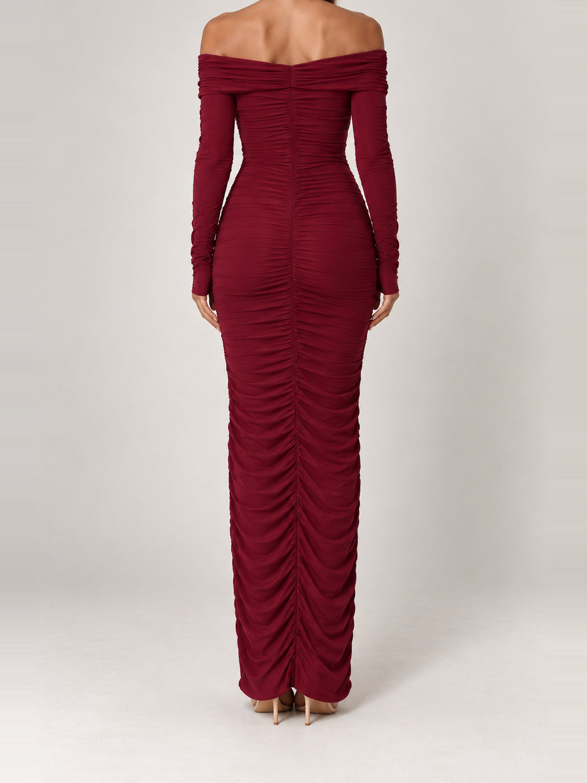 CHRISTA burgundy off-shoulder maxi dress, back view showing the gathered neckline and full-length ruching.