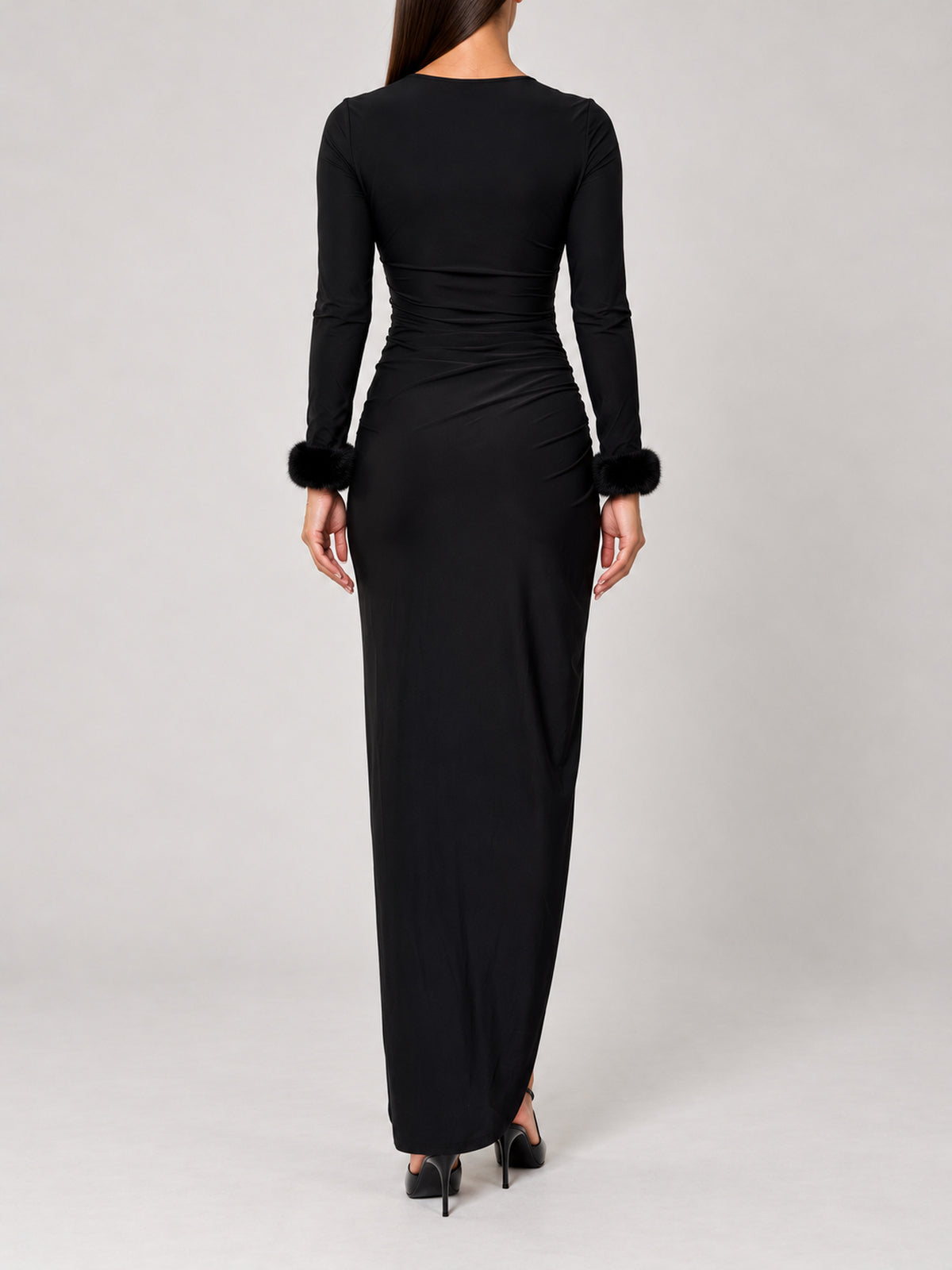 Black faux fur slap cuffs styled on the Jas dress, back view