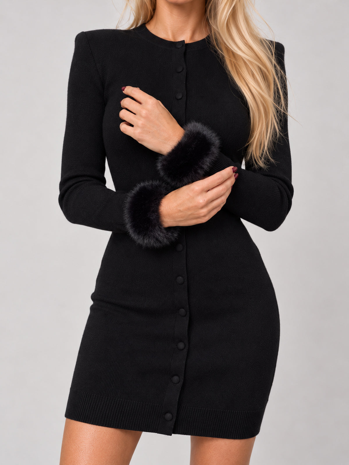 HAILEY black fine-knit dress styled with black faux-fur slap-on cuffs, sold separately, and a burgundy manicure.